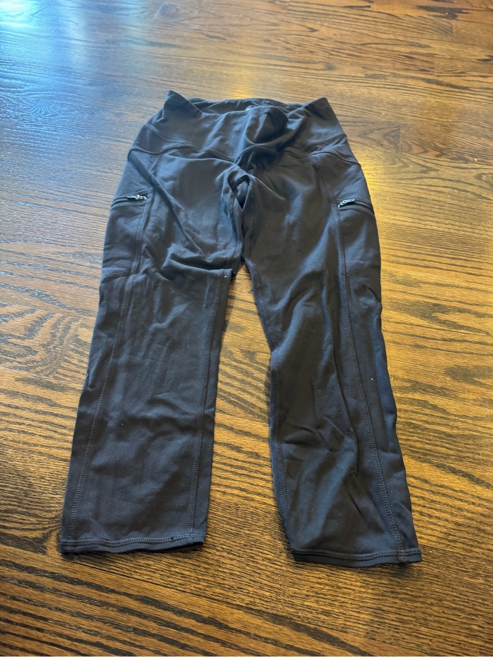Athleta Black Performance Capri Leggings with Side Zip Pockets